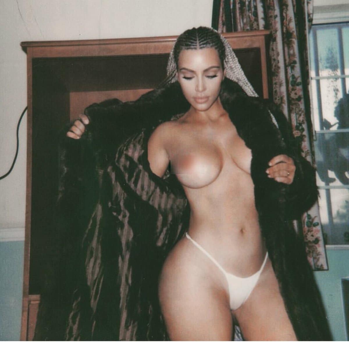 Kim K undressed in robe
